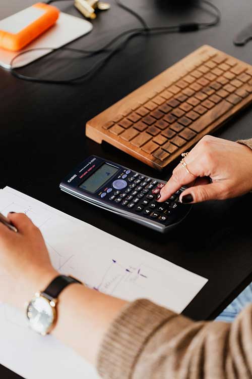 calculator-paper Typing on a calculator